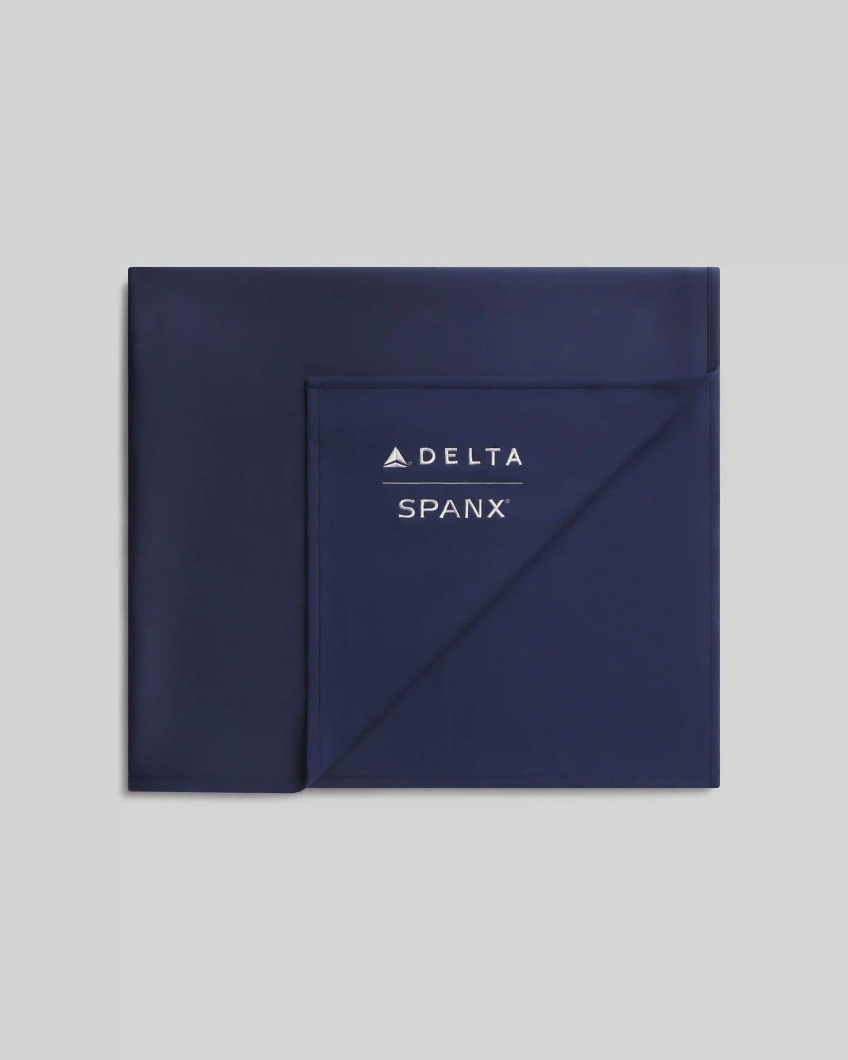 Delta x SPANX AirEssentials® Blanket